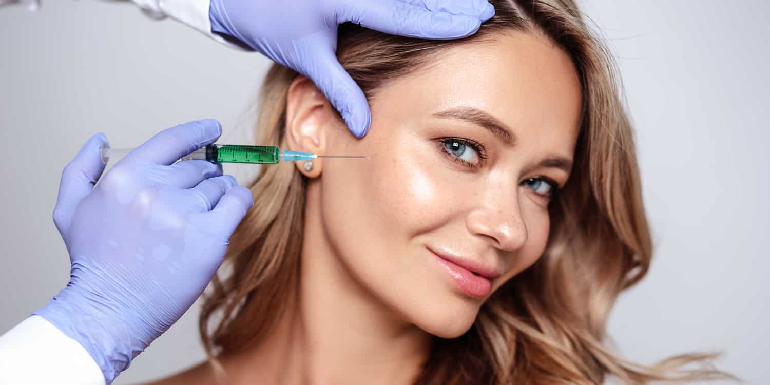 A woman getting a liquid facelift